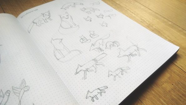My fox sketches. At the top you can see I start out just drawing foxes, and as I work down the page, I start to simplify and break the fox down into basic shapes.